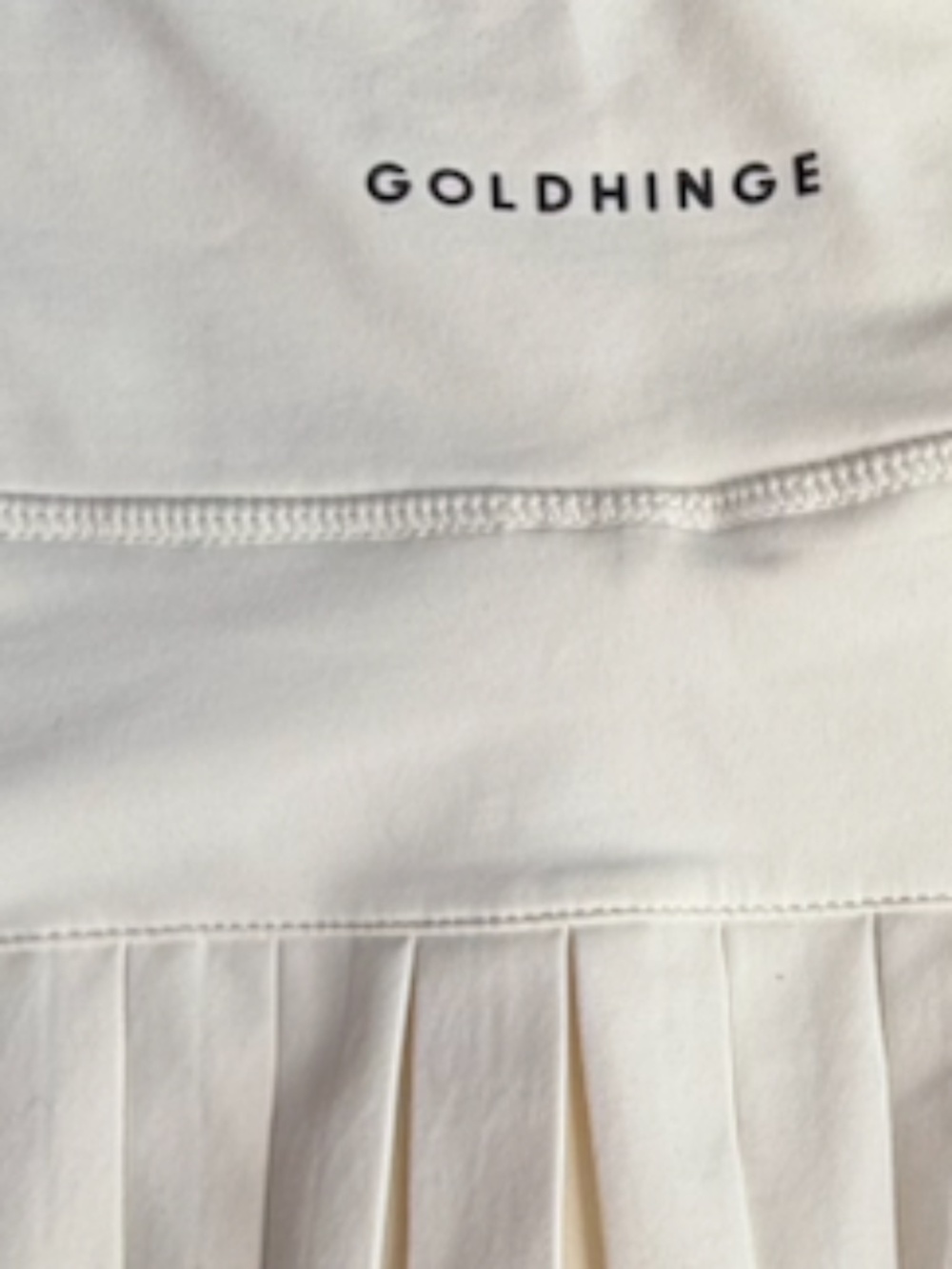 GOLD HINGE BUTTER YELLOW PLEATED TENNIS SKIRT & BLACK PLEATED TENNIS SKIRT